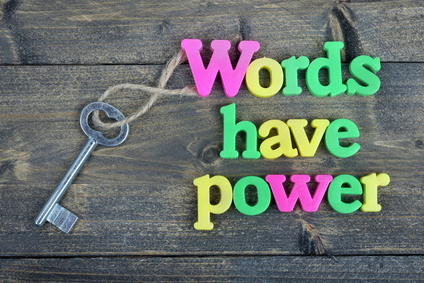 Words have power on wooden table